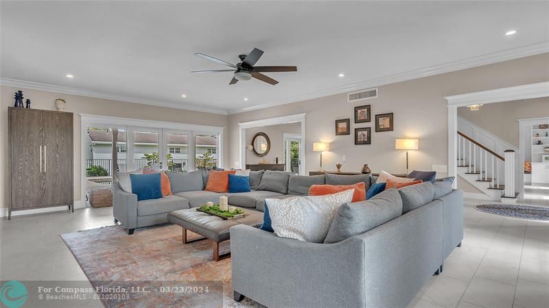 8585 Ranch Road Parkland, FL 33067 - Photo 25 of 69 a living room with furniture and a ceiling fan