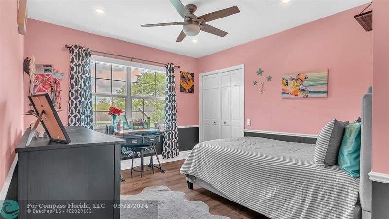 8585 Ranch Road Parkland, FL 33067 - Photo 39 of 69 a bedroom with a bed and a large window