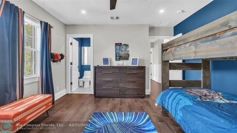 8585 Ranch Road Parkland, FL 33067 - Photo 40 of 69 a bedroom with a bed and dresser