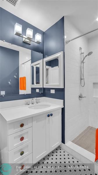 8585 Ranch Road Parkland, FL 33067 - Photo 42 of 69 a bathroom with a sink and a mirror