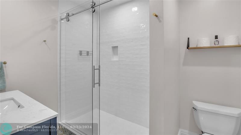 8585 Ranch Road Parkland, FL 33067 - Photo 58 of 69 a bathroom with a shower and toilet