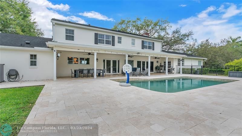 8585 Ranch Road Parkland, FL 33067 - Photo 64 of 69 a view of house with swimming pool and sitting area
