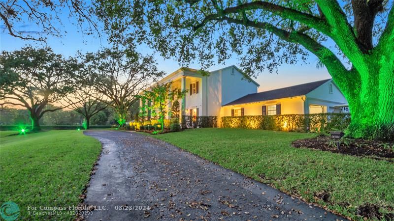 8585 Ranch Road Parkland, FL 33067 - Photo 69 of 69 a view of a house with a yard