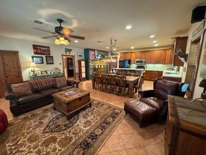 215 70l Rd Junction Junction, TX 76849 - Photo 11 of 43 a living room with furniture and a wooden floor