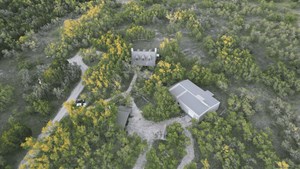 215 70l Rd Junction Junction, TX 76849 - Photo 2 of 43 an aerial view of a house with a yard and a lake view