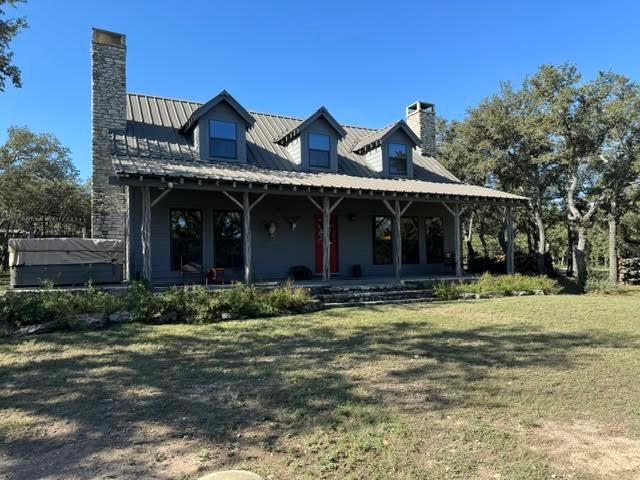 215 70l Rd Junction Junction, TX 76849 - Photo 3 of 43 a front view of a house with a porch