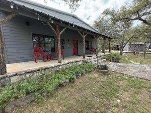 215 70l Rd Junction Junction, TX 76849 - Photo 4 of 43 a view of a house with backyard and sitting area