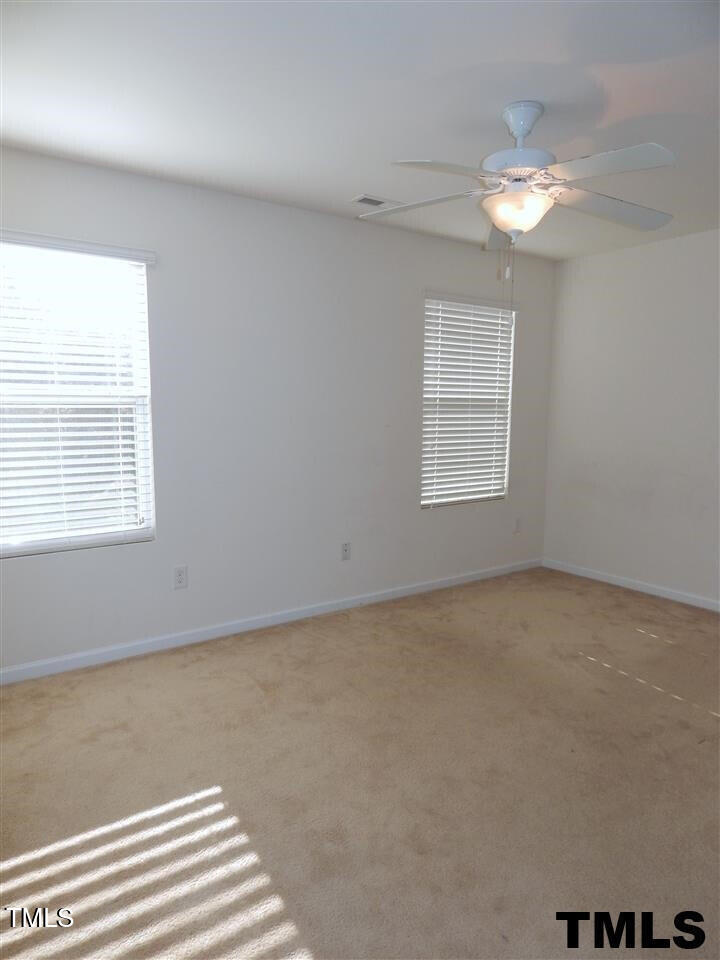2403 Savior Street Raleigh, NC 27610 - Photo 11 of 21 a view of an empty room with a window