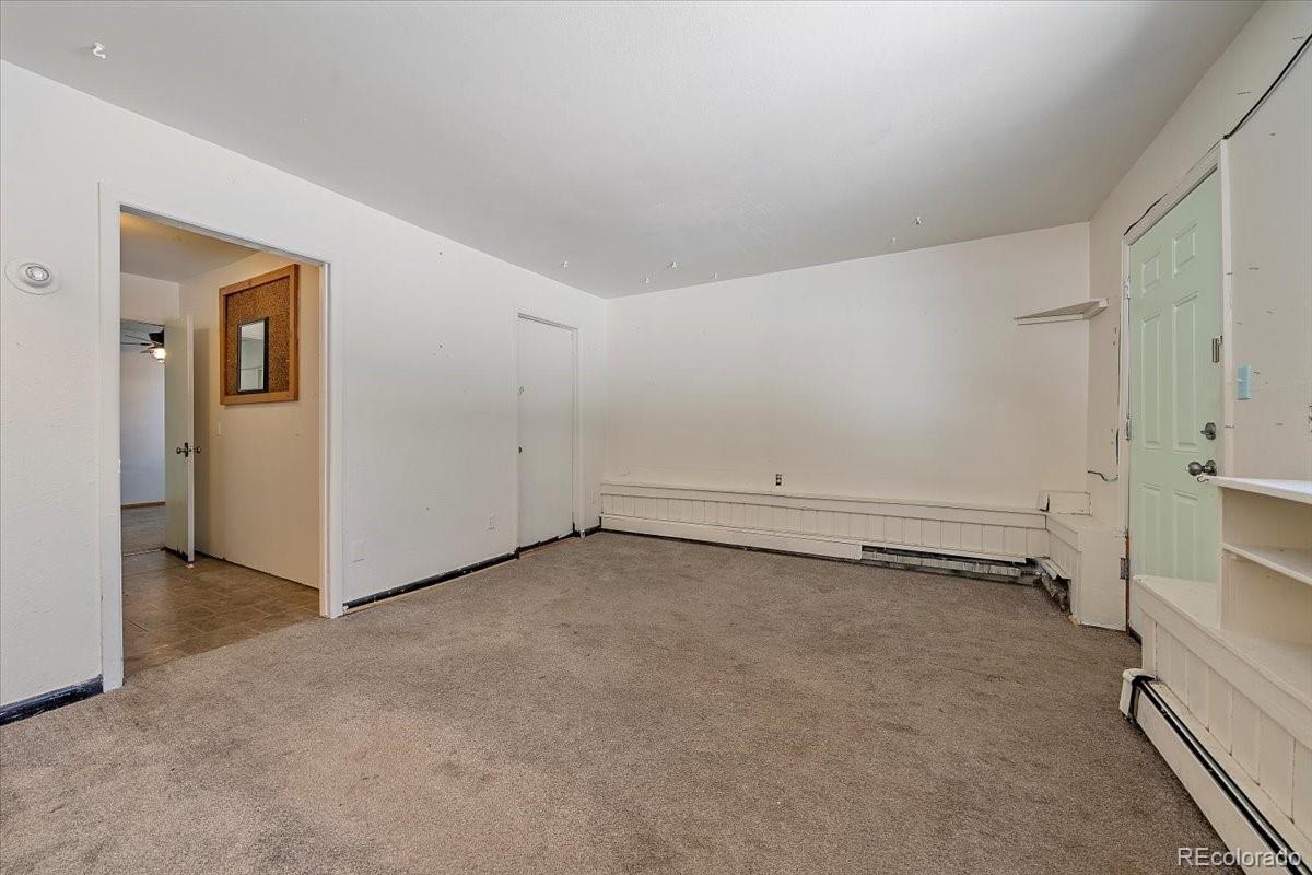 4551 Hilltop Road Evergreen, CO 80439 - Photo 15 of 30 a view of an empty room