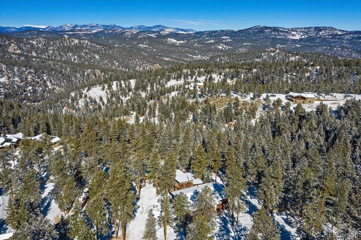 4551 Hilltop Road Evergreen, CO 80439 - Photo 24 of 30 a view of city and mountain