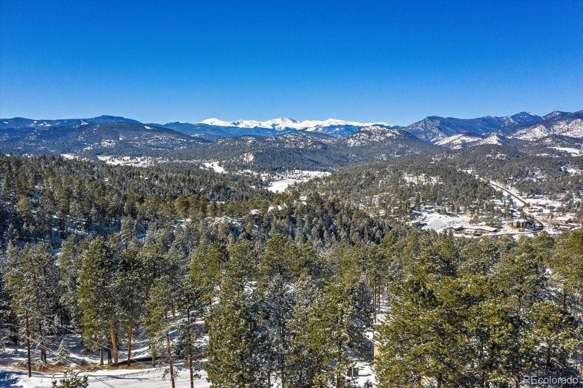 4551 Hilltop Road Evergreen, CO 80439 - Photo 27 of 30 a view of city and mountain