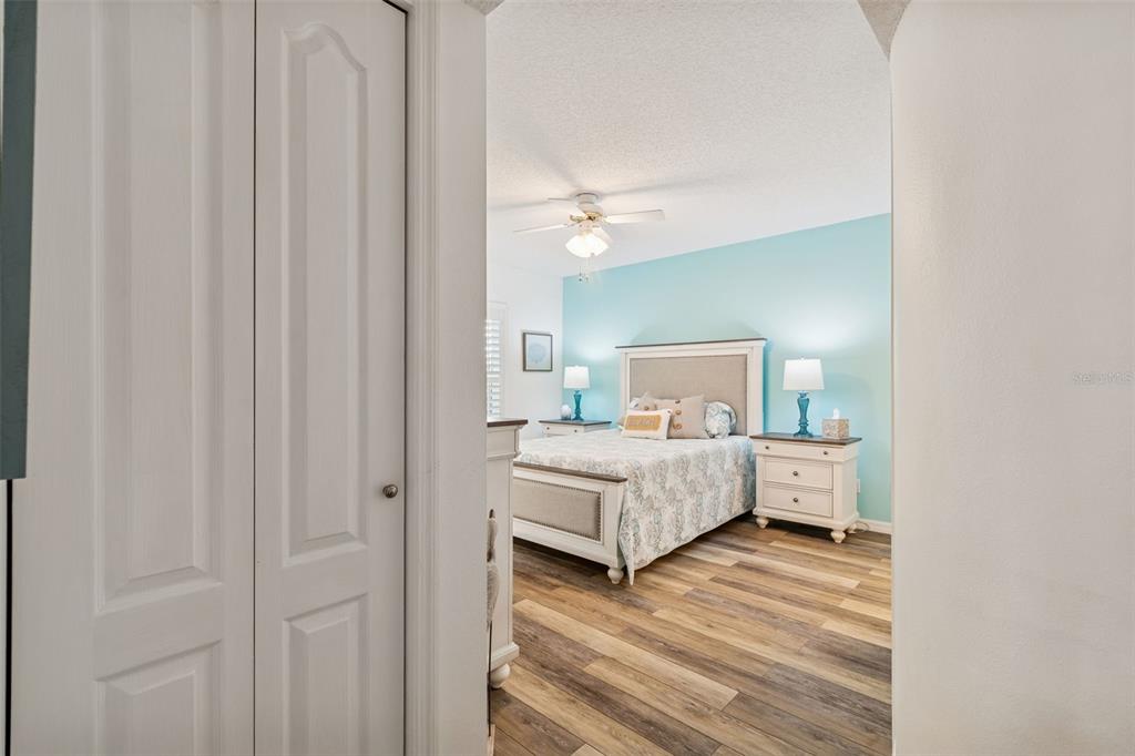 2291 Americus Boulevard West, Unit 3 Clearwater, FL 33763 - Photo 21 of 88 a bedroom with a bed and a window