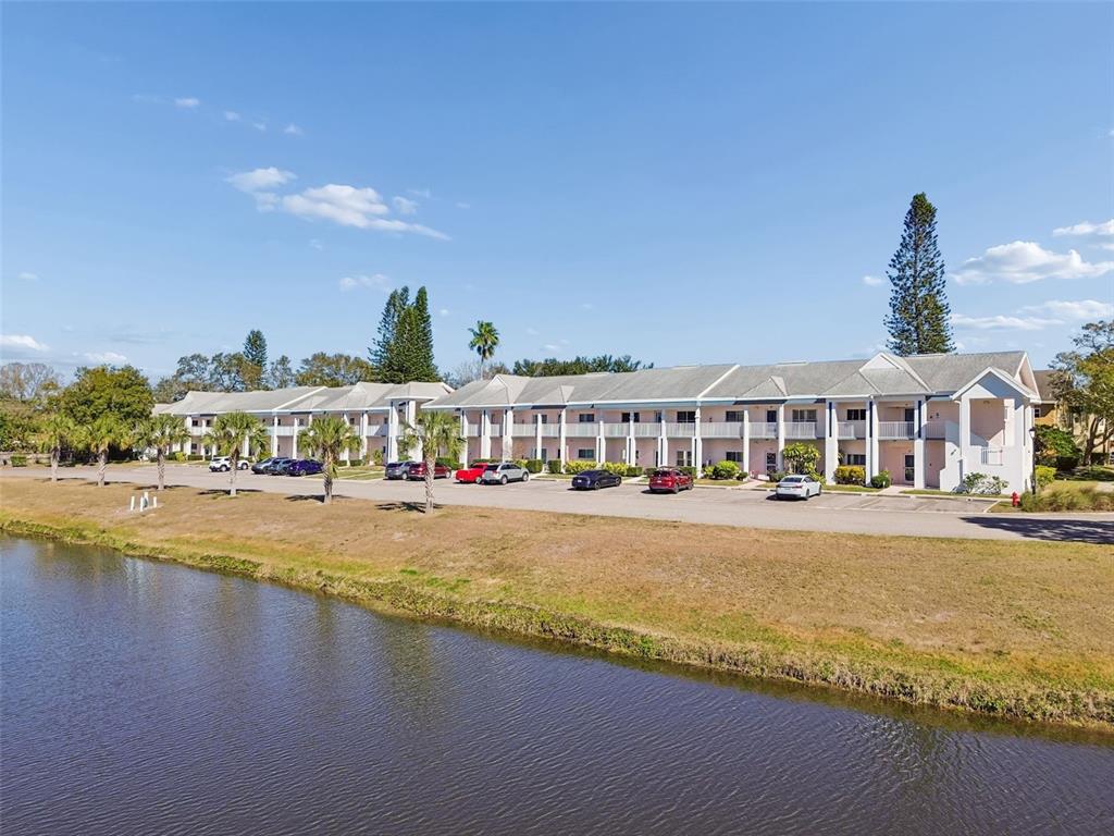 2291 Americus Boulevard West, Unit 3 Clearwater, FL 33763 - Photo 42 of 88 a view of an ocean with swimming pool and lake view