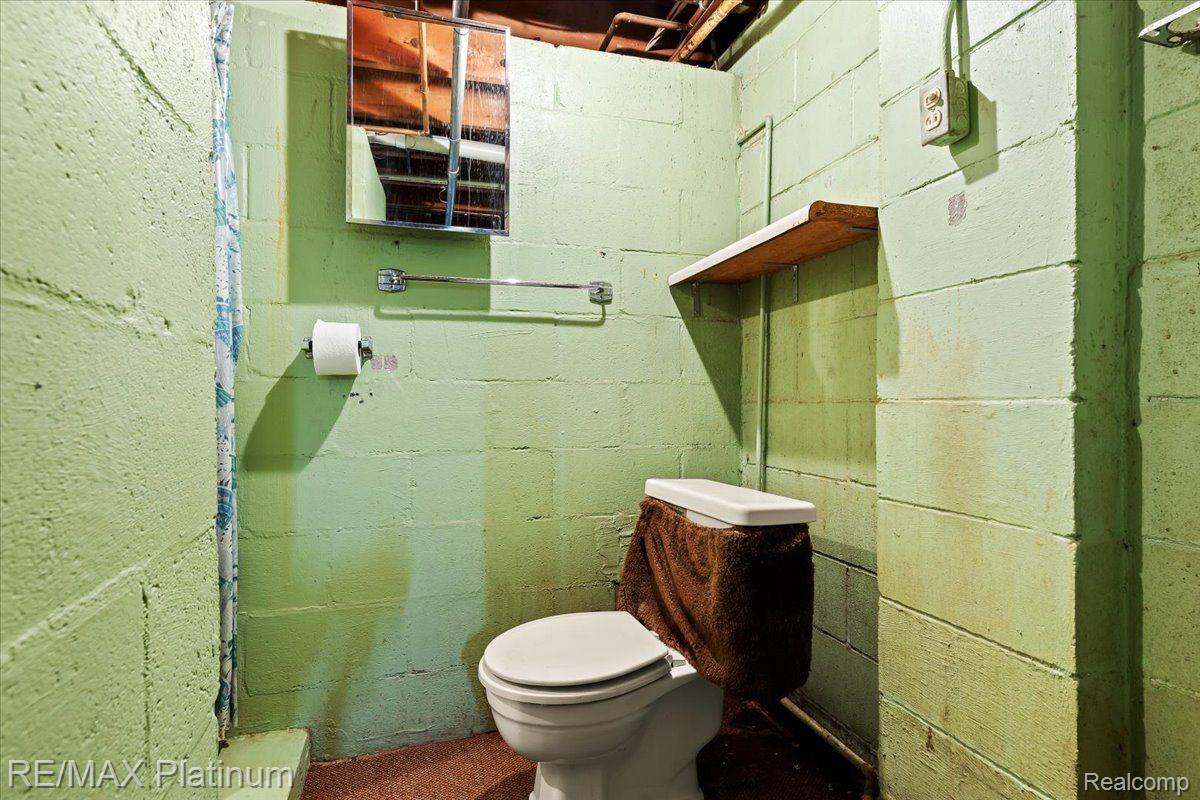2606 Sexton Road Howell, MI 48843 - Photo 37 of 43 Basement has its own convenient half bath.