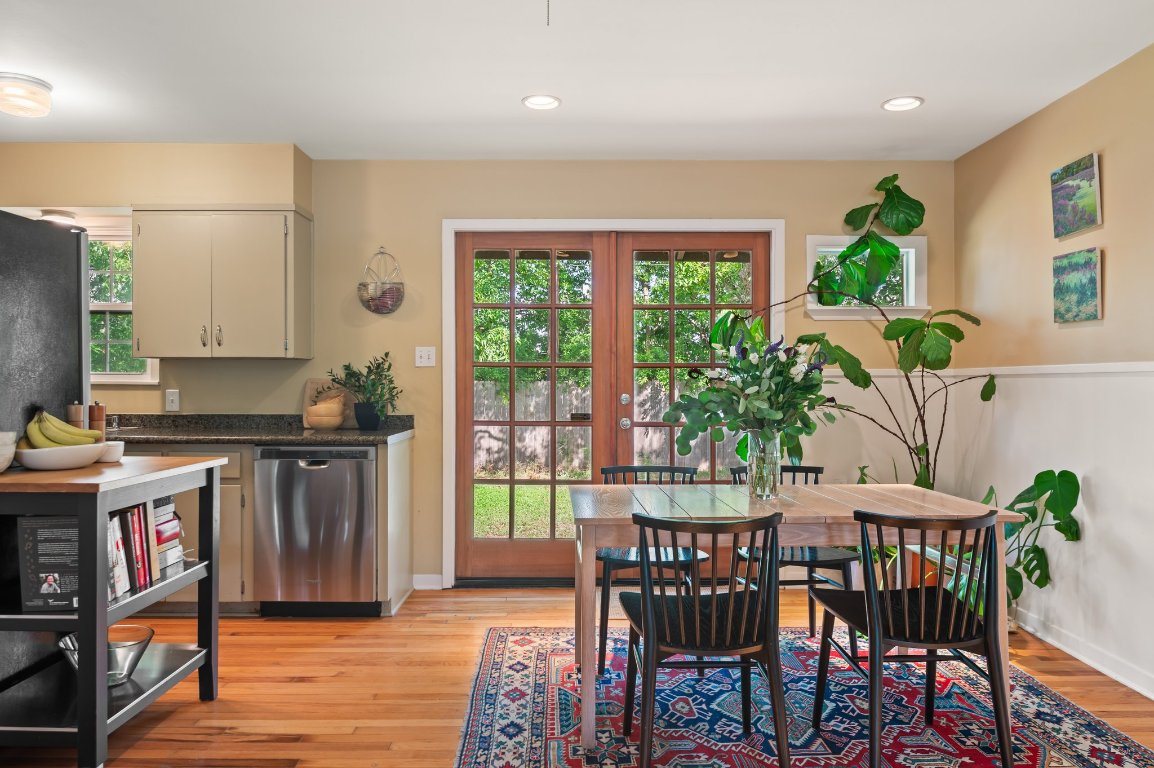 8201 Lazy Lane Austin, TX 78757 - Photo 1 of 1 a view of a dining room with furniture window and wooden floor