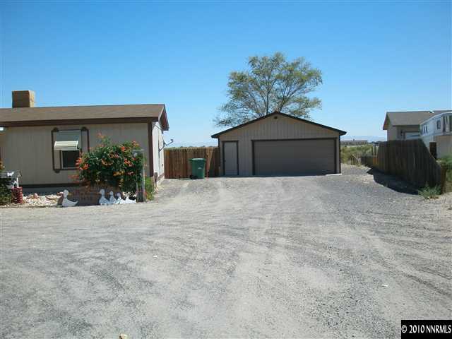 1672 Soda Lake Road Fallon, NV 89406 - Photo 2 of 9 a view of a house with a outdoor space