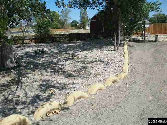 1672 Soda Lake Road Fallon, NV 89406 - Photo 3 of 9 a view of a yard covered in snow