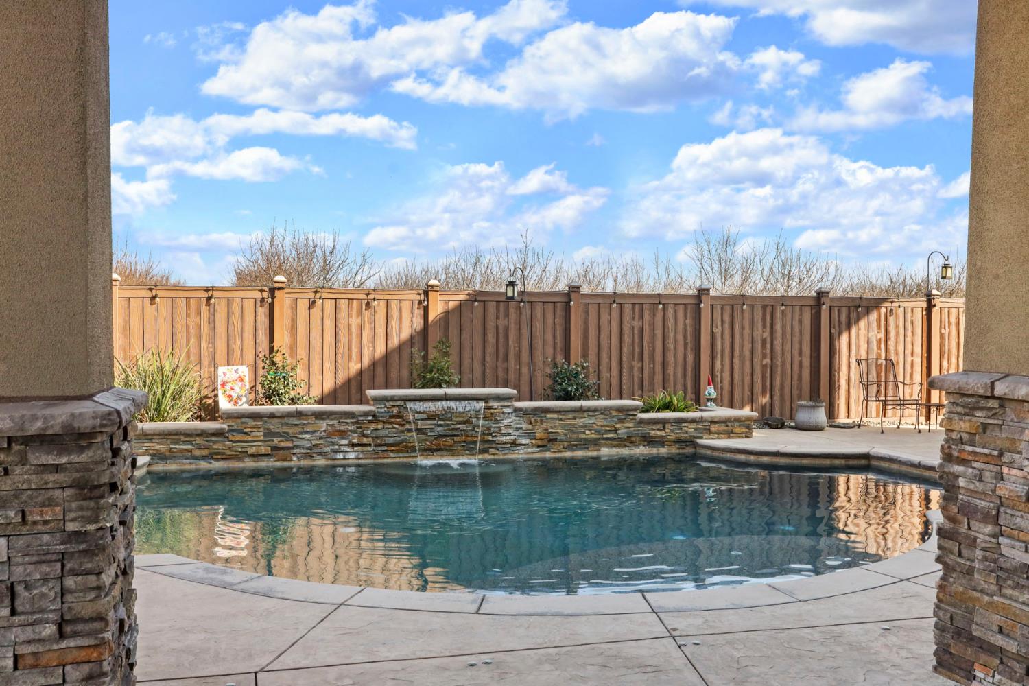 23346 Frederick Road Ripon, CA 95366 - Photo 72 of 96 a view of swimming pool with outdoor seating and yard in back