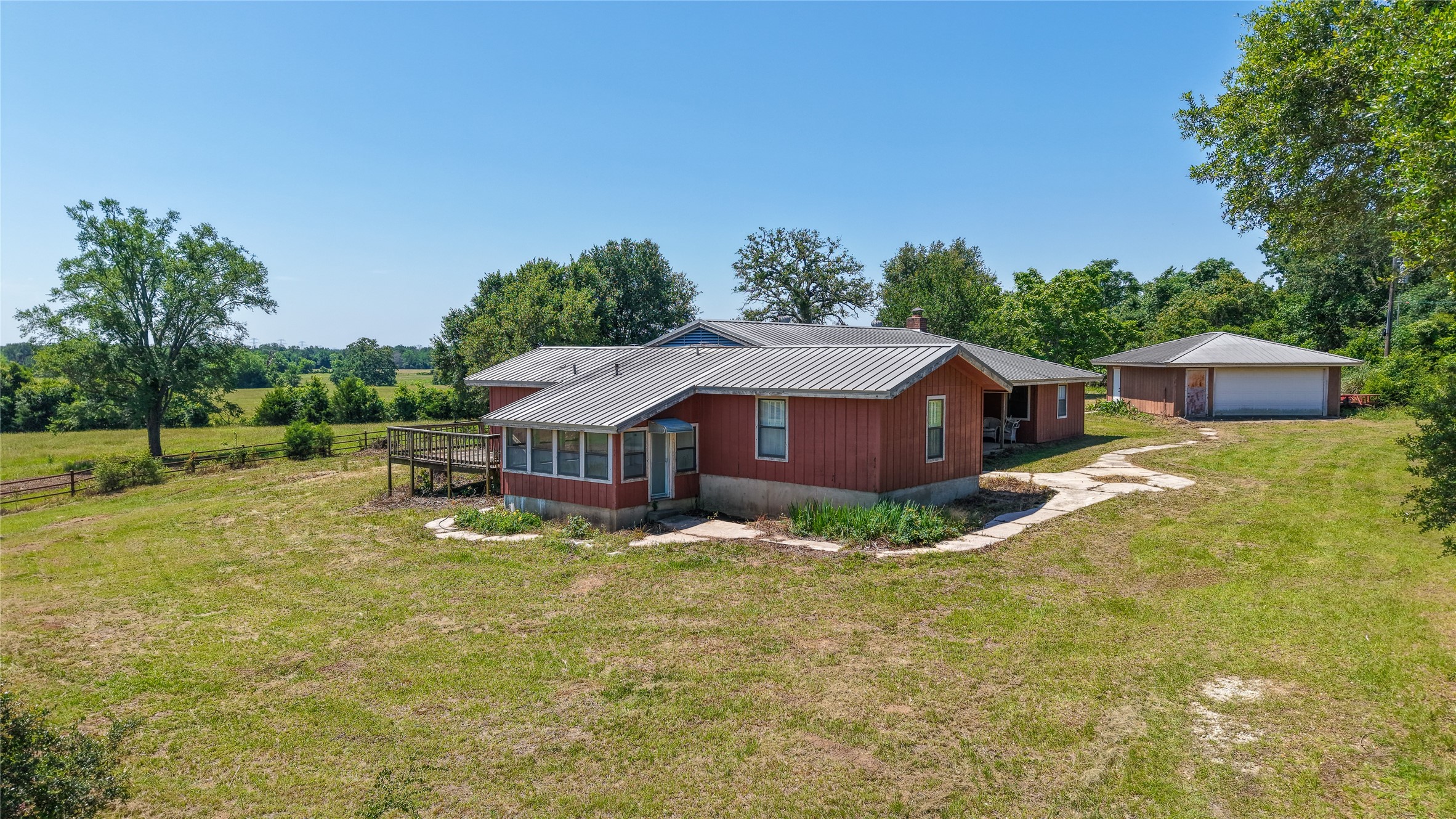 3765 Poteet Road Normangee, TX 77871 - Photo 22 of 37 a view of a house with a big yard
