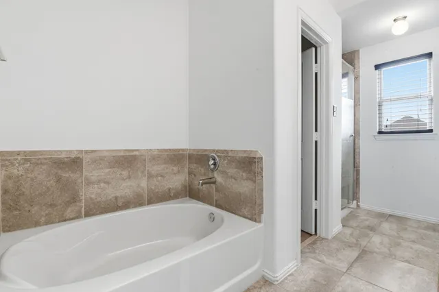 a bathroom with a bathtub