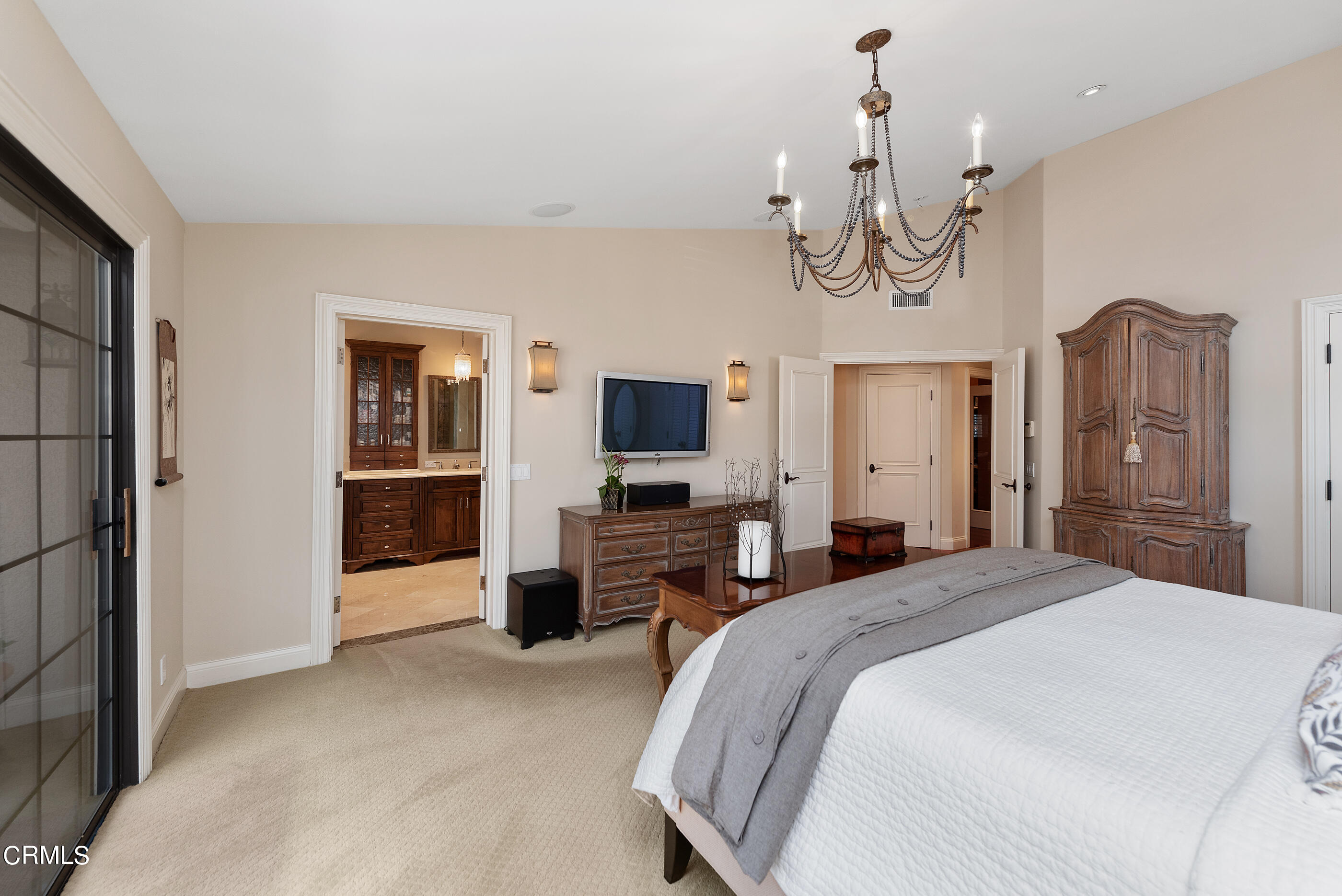 6893 Aviano Drive Camarillo, CA 93012 - Photo 26 of 67 a bedroom with a bed dresser and a flat tv screen