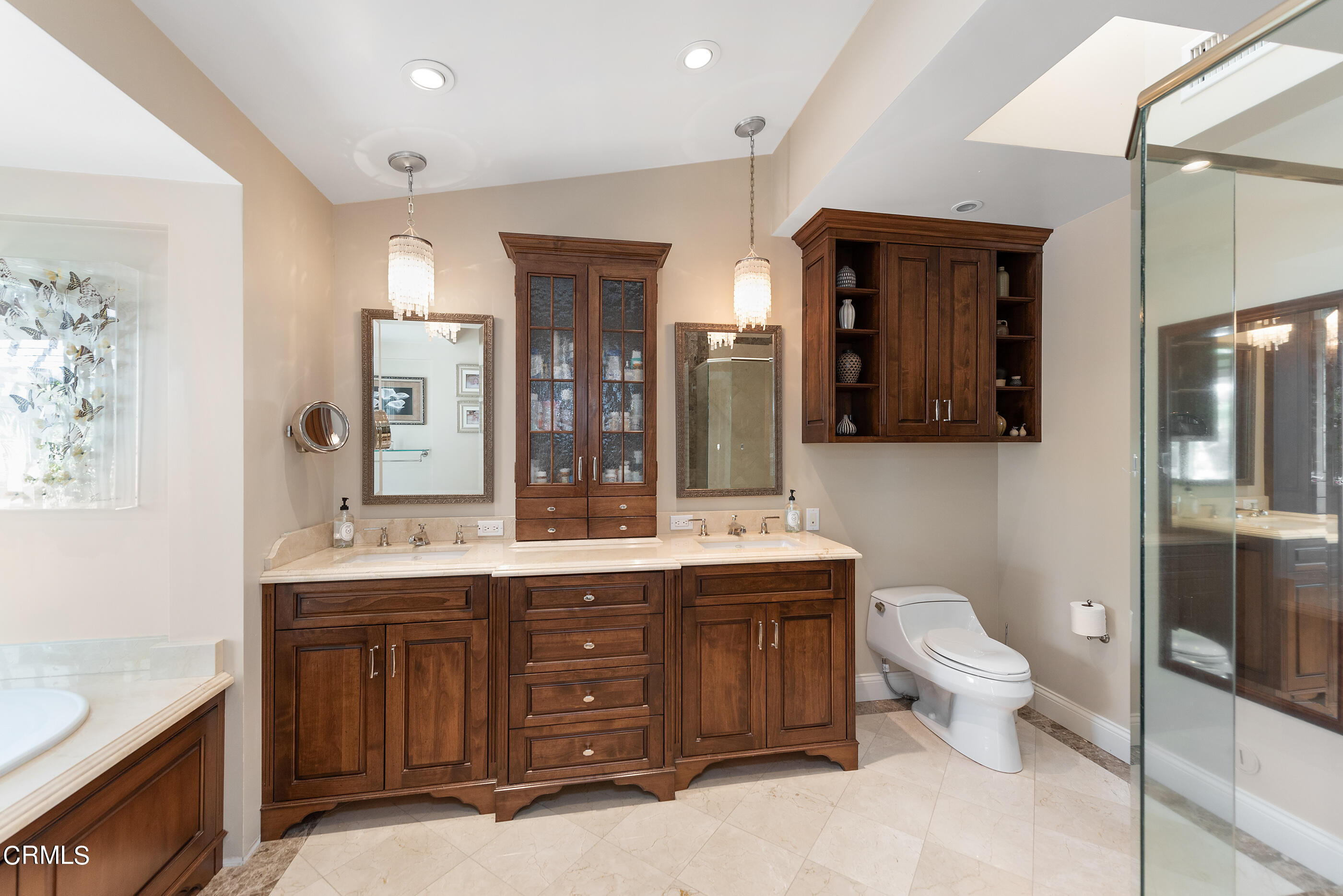 6893 Aviano Drive Camarillo, CA 93012 - Photo 29 of 67 a spacious bathroom with a granite countertop sink mirror and toilet
