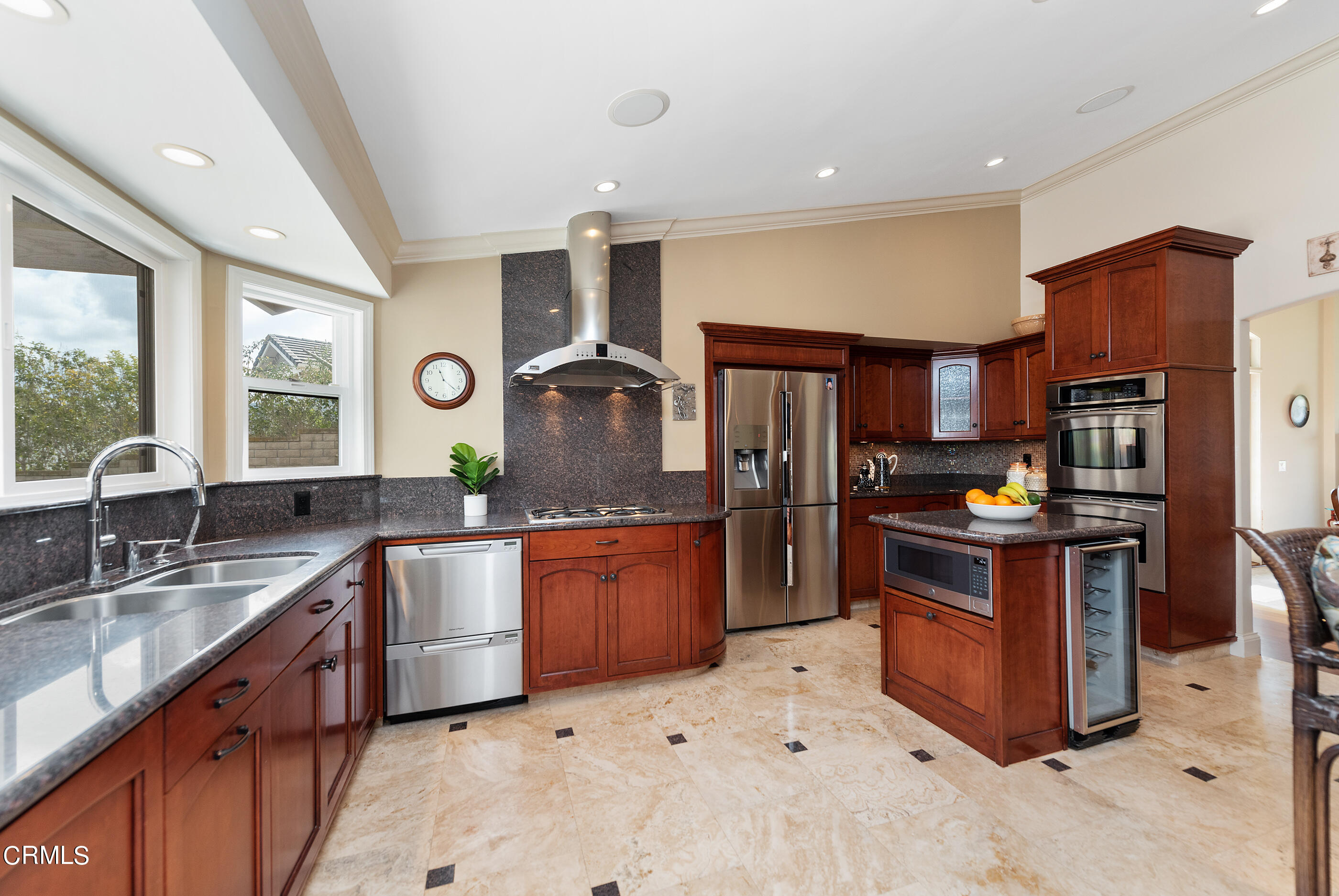 6893 Aviano Drive Camarillo, CA 93012 - Photo 3 of 67 a kitchen with stainless steel appliances granite countertop a sink stove and refrigerator