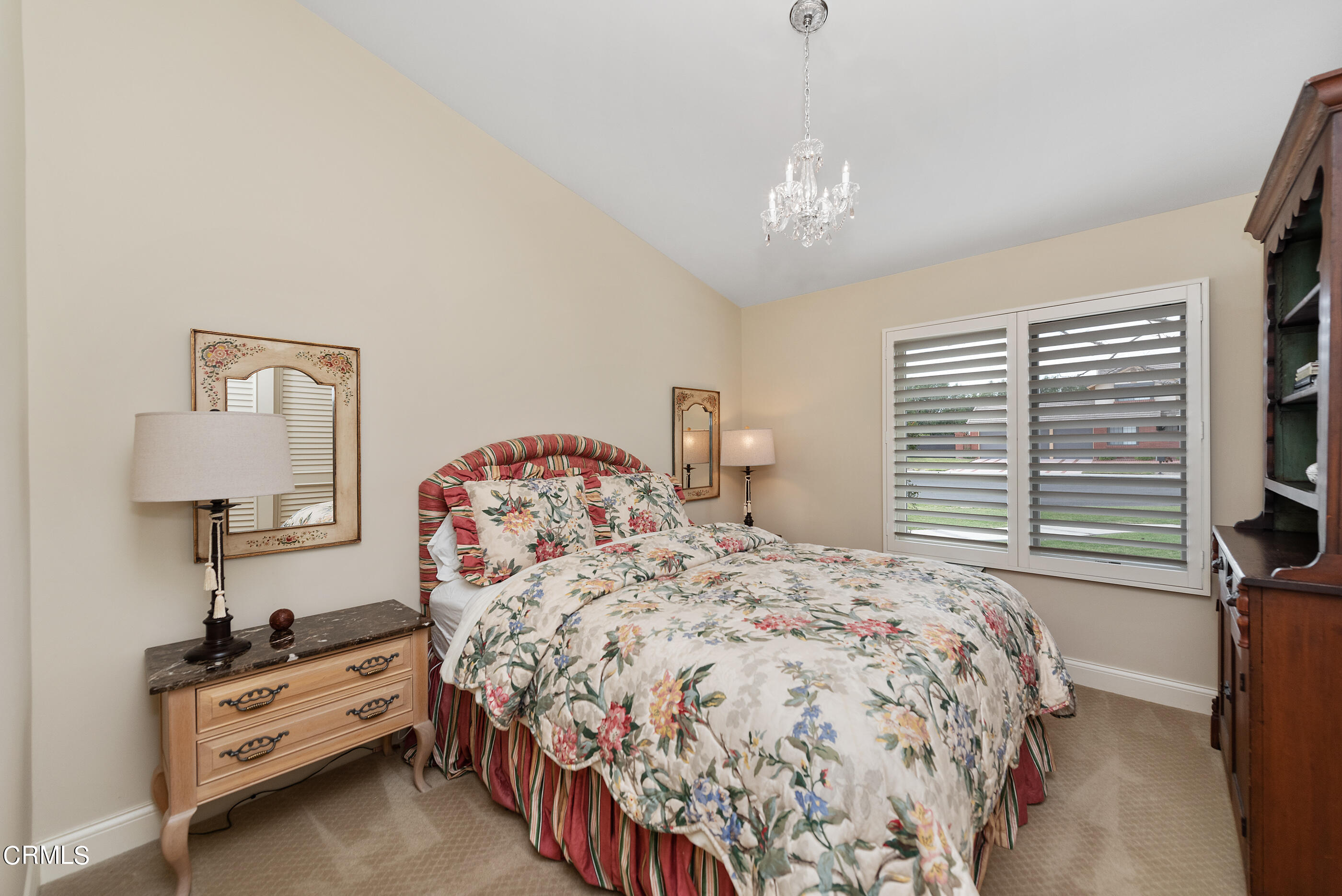 6893 Aviano Drive Camarillo, CA 93012 - Photo 31 of 67 a bedroom with a bed and a lamp on dresser