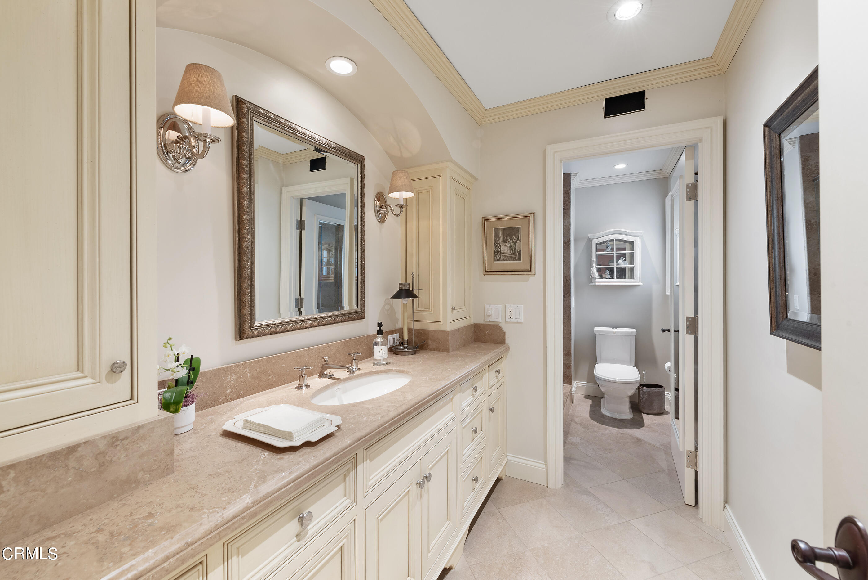 6893 Aviano Drive Camarillo, CA 93012 - Photo 33 of 67 a spacious bathroom with a granite countertop sink and a mirror