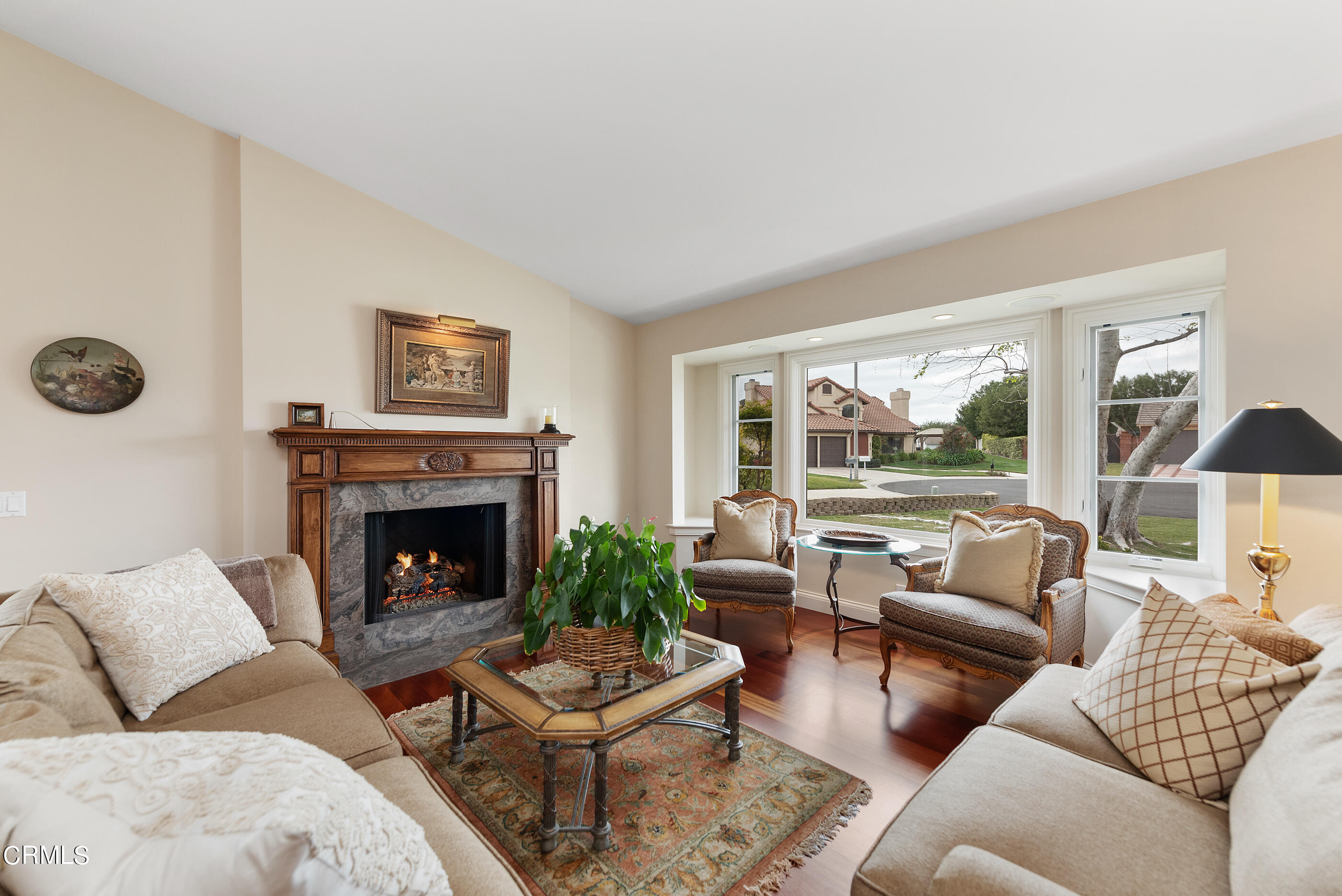 6893 Aviano Drive Camarillo, CA 93012 - Photo 4 of 67 a living room with furniture and a fireplace