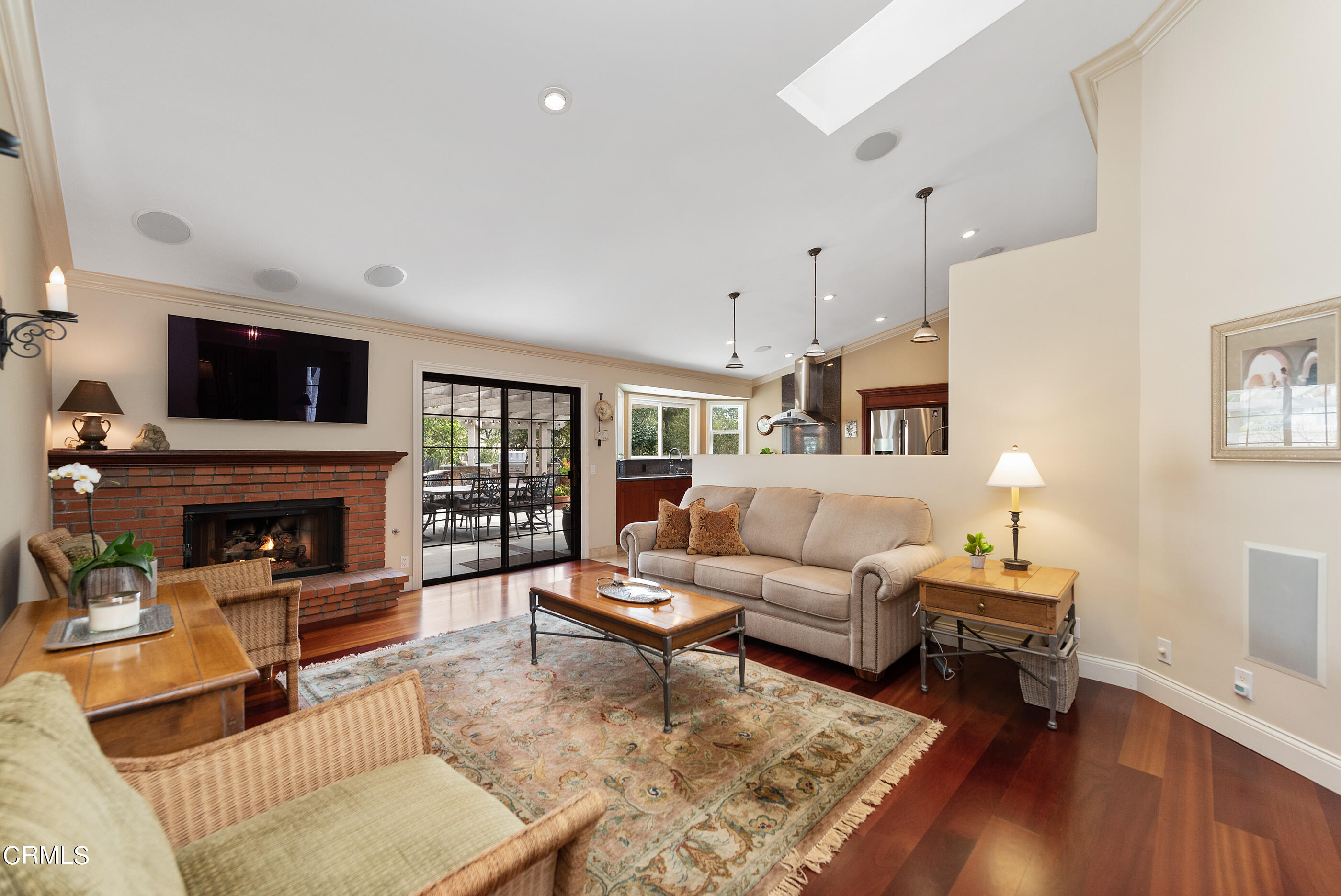 6893 Aviano Drive Camarillo, CA 93012 - Photo 8 of 67 a living room with furniture a fireplace and a flat screen tv