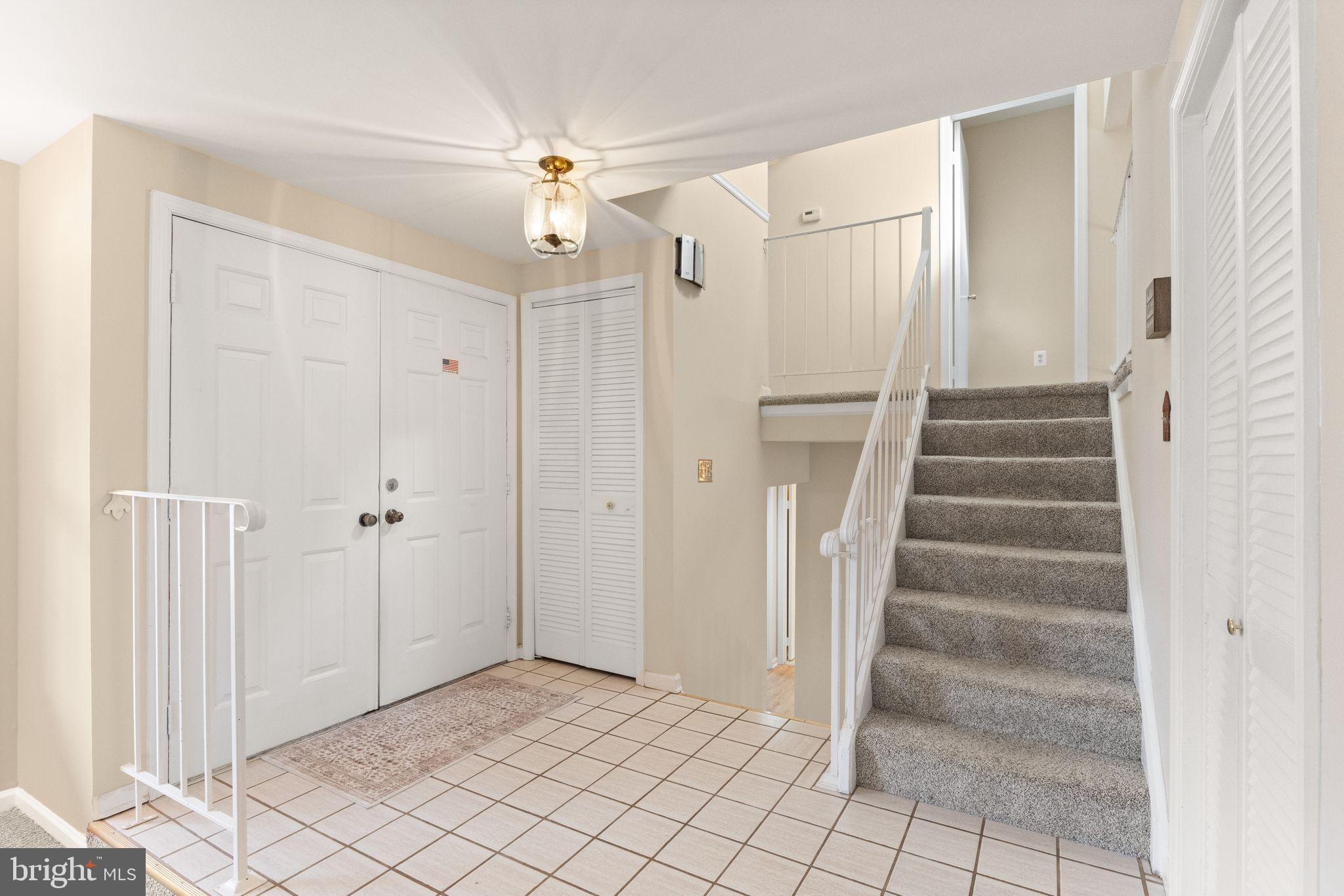 6027 Ridge Ford Drive Burke, VA 22015 - Photo 14 of 74 foyer with large closet / storage