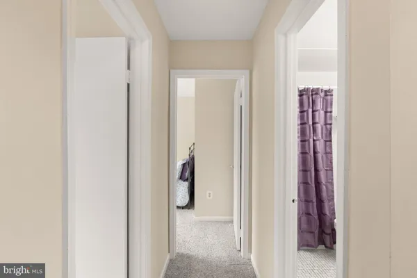 a bedroom with furniture and a wooden floor