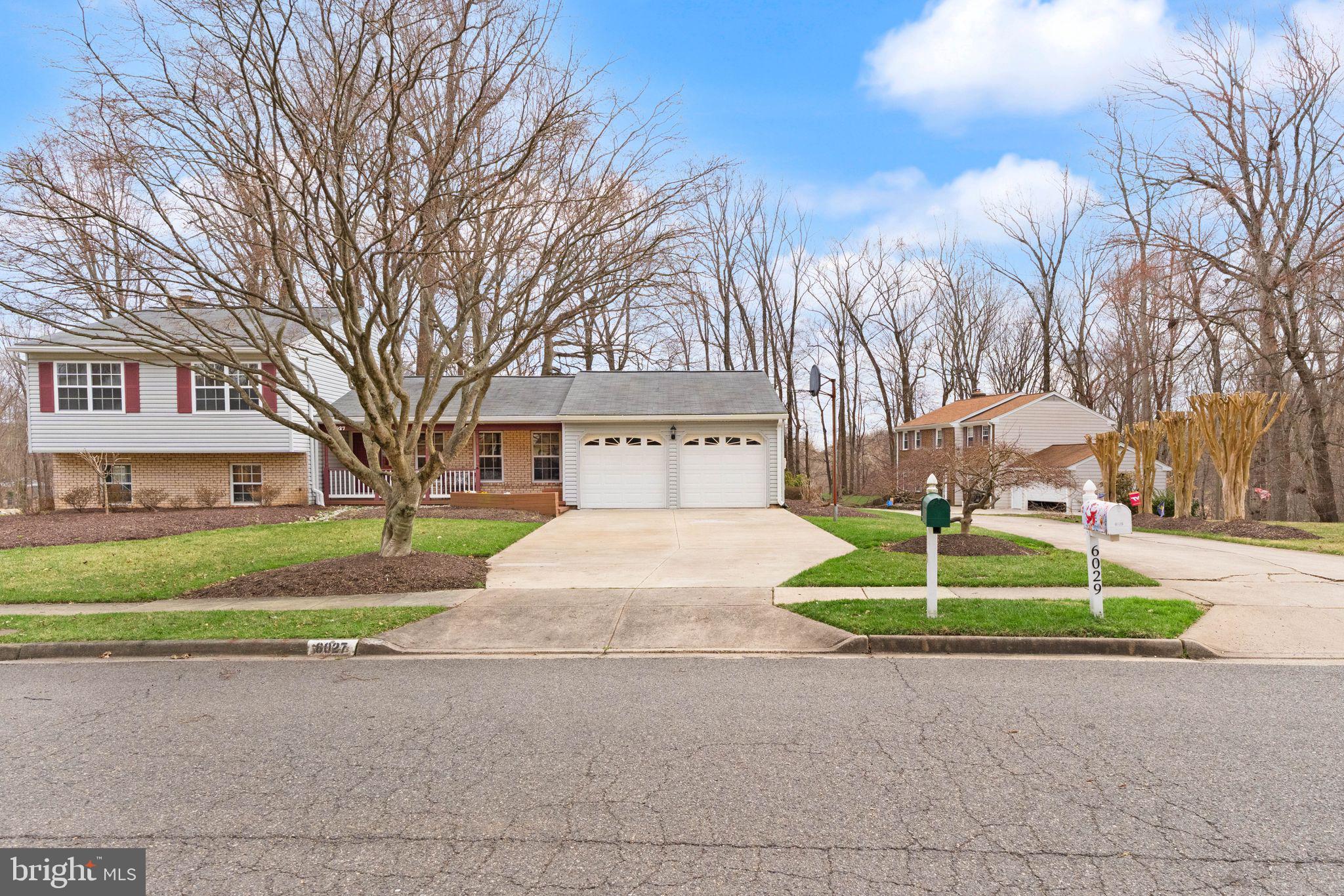 6027 Ridge Ford Drive Burke, VA 22015 - Photo 7 of 74 two car garage with large driveway