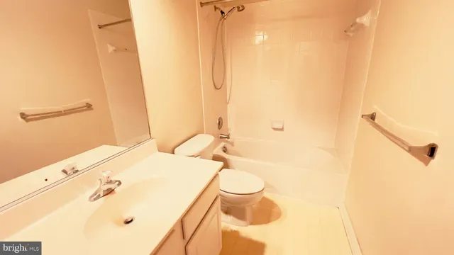 a bathroom with a sink and a shower