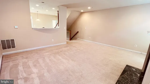 a kitchen with cabinets a sink and appliances