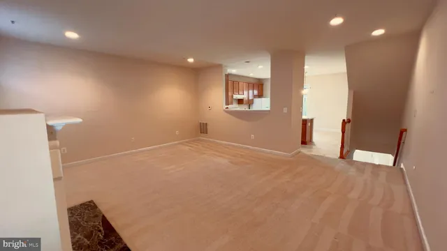 a view of a livingroom with a staircase