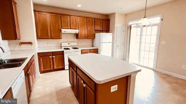a bathroom with a sink a mirror and a bathtub