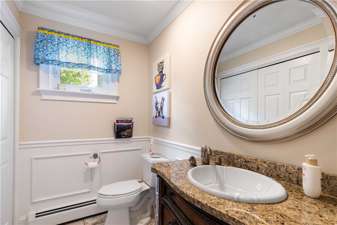 5 Victoria Lane Rehoboth, MA 02769 - Photo 18 of 48 Off the hallway is a tiled half bath.