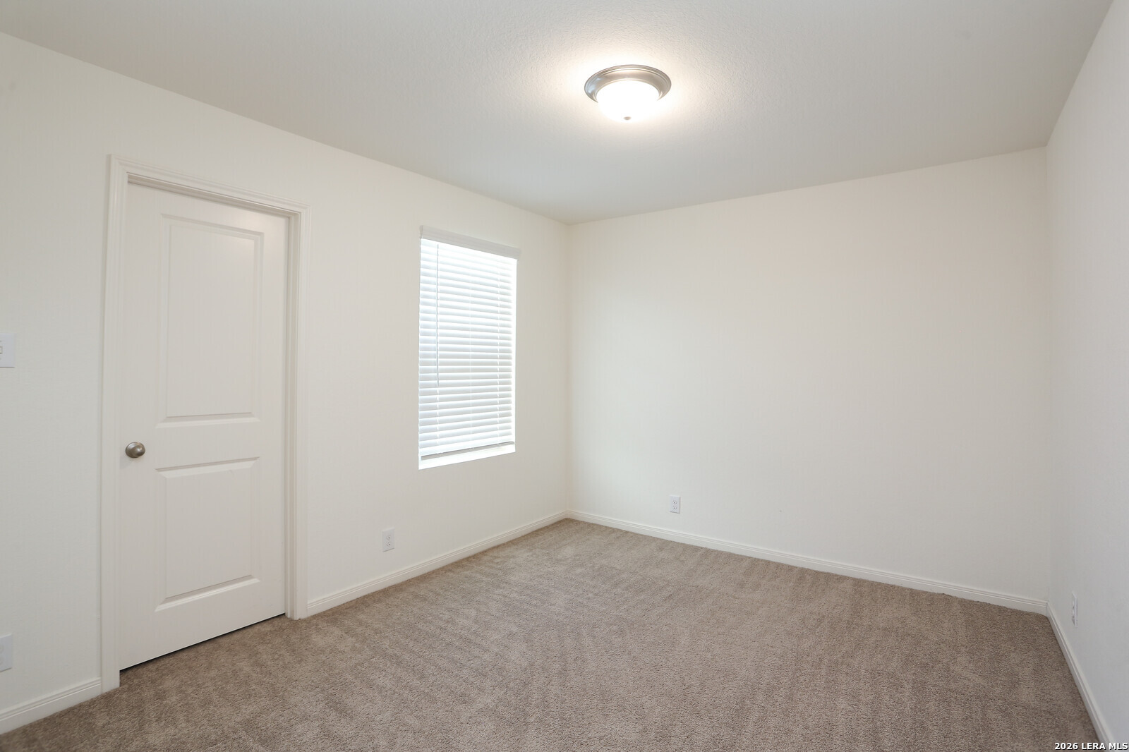 4913 Hallies Garden St. Hedwig, TX 78152 - Photo 17 of 23 an empty room with a window