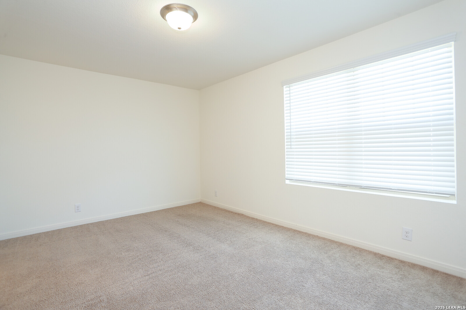 4913 Hallies Garden St. Hedwig, TX 78152 - Photo 19 of 23 an empty room with a window
