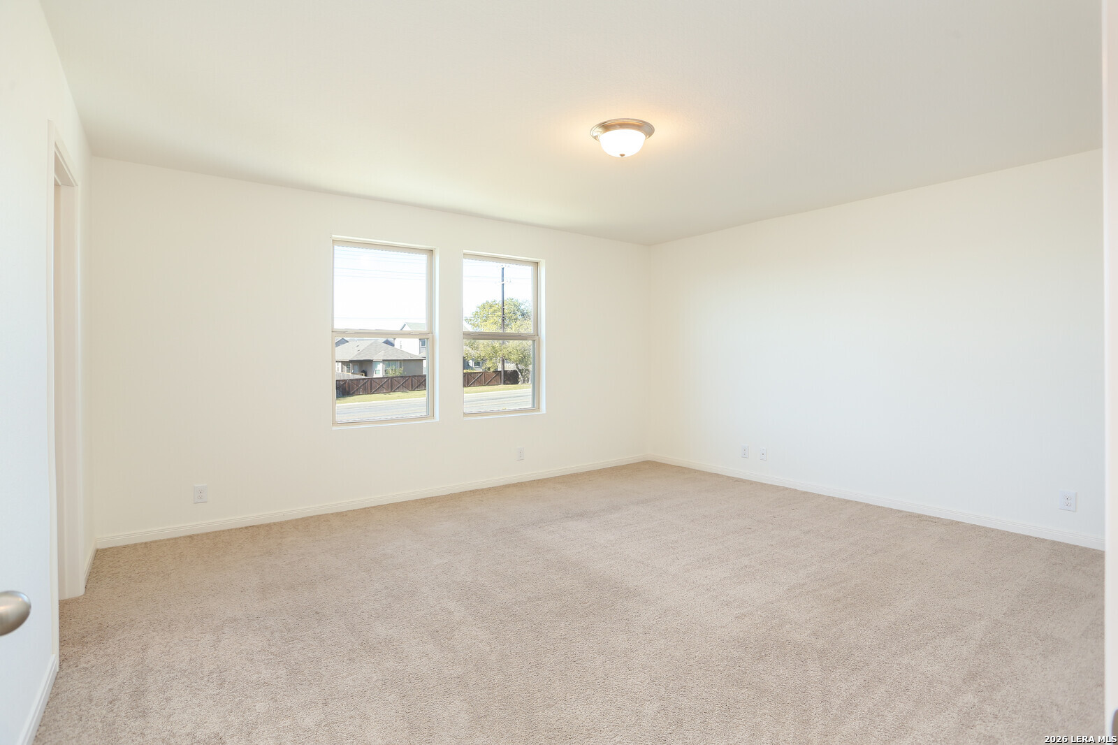 4913 Hallies Garden St. Hedwig, TX 78152 - Photo 10 of 23 an empty room with windows