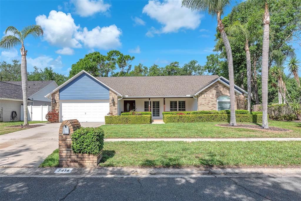 front view of a house with a yard