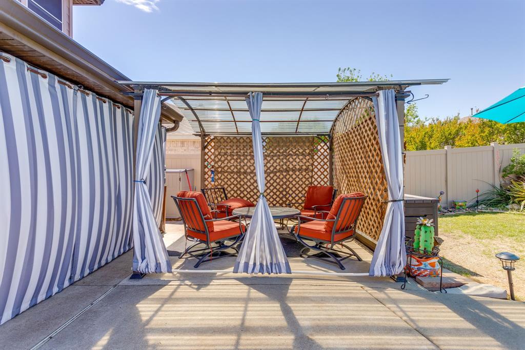 4816 Sleepy Ridge Circle Fort Worth, TX 76133 - Photo 31 of 36 Fenced backyard with a patio and a pergola
