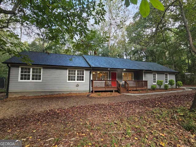a house view with a backyard space