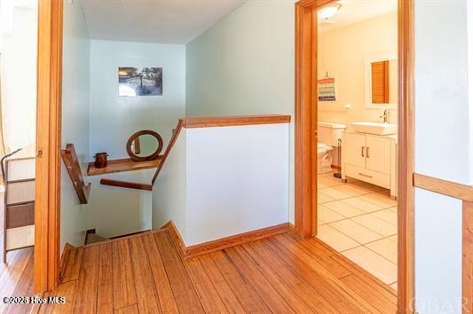 758 Fish Crow Court Corolla, NC 27927 - Photo 17 of 31 Stairwell to Top Floor
