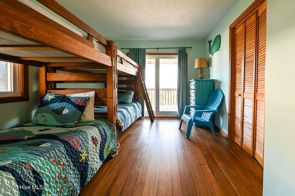 758 Fish Crow Court Corolla, NC 27927 - Photo 10 of 31 Bunk room w deck access