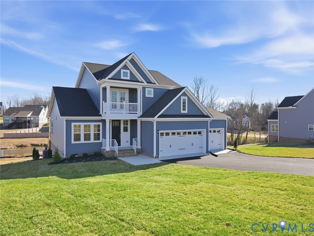 1711 Reed Marsh Lane Goochland, VA 23063 - Photo 25 of 25 a front view of a house with garden