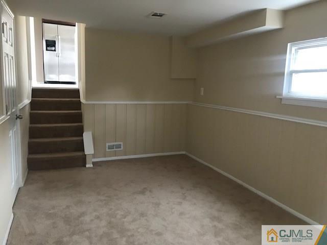 218 McFarlane Road Colonia, NJ 07067 - Photo 14 of 18 a view of an empty room with a window