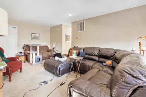 a living room with furniture and a couch